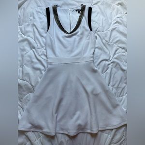 XOXO Beaded White mini dress with pockets and v neck
